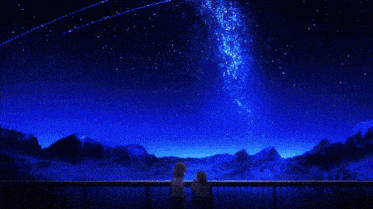 two people looking up at a starry sky