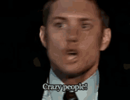 a man in a suit and tie says crazy people .