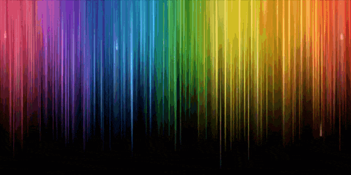 a rainbow of colors on a dark background