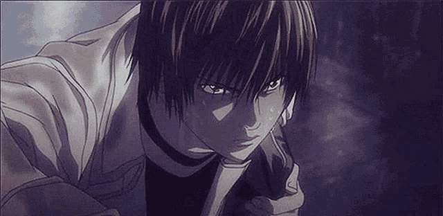 a close up of a person holding a knife in their hand