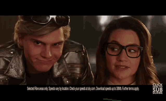 a man and a woman are standing next to each other with the words click here to sub scribe on the bottom right