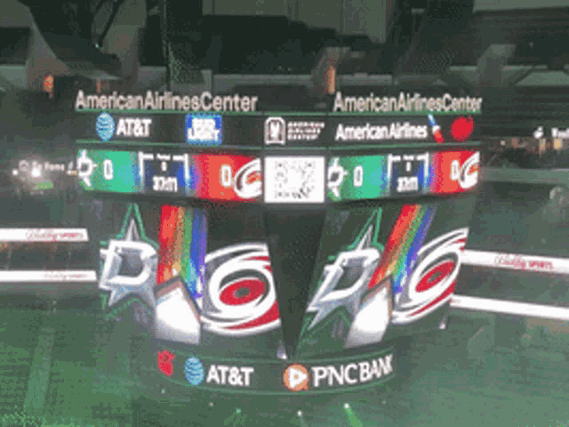 a scoreboard at the american airlines center with bud light and at & t