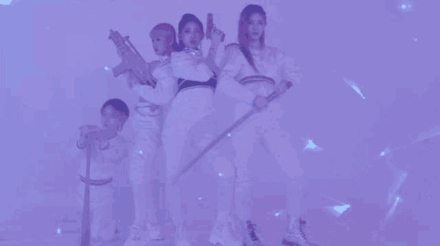 a group of women holding guns and swords