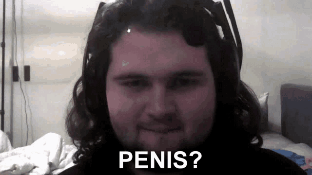a man with long hair and a beard is asking the question penis