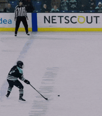 a hockey player with the number 13 on their back