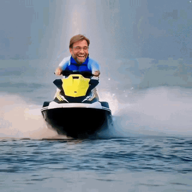 a man on a jet ski in the ocean