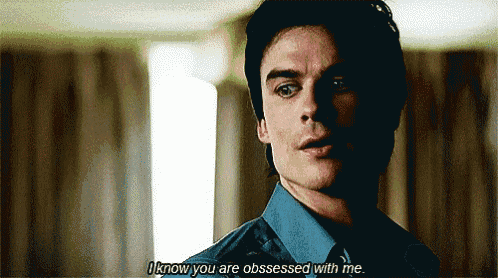 a man says " i know you are obsessed with me " in a dark room