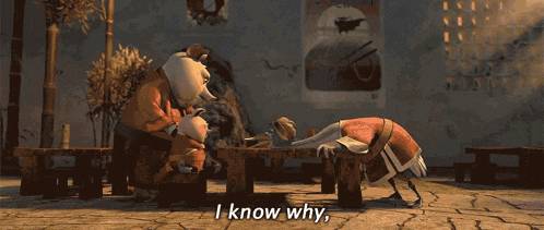a cartoon duck laying on a wooden table with the words but why written below it