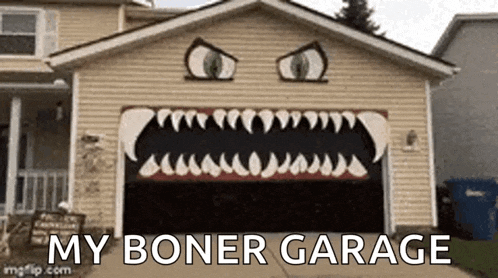 a house with a garage door decorated like a shark with the words `` my boner garage '' written on it .
