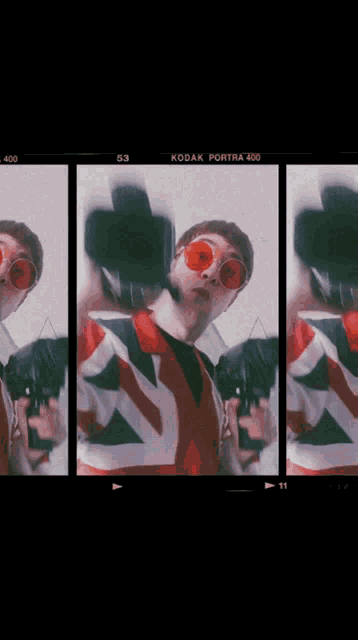 a kodak portrait 400 film shows a man wearing red sunglasses holding a camera
