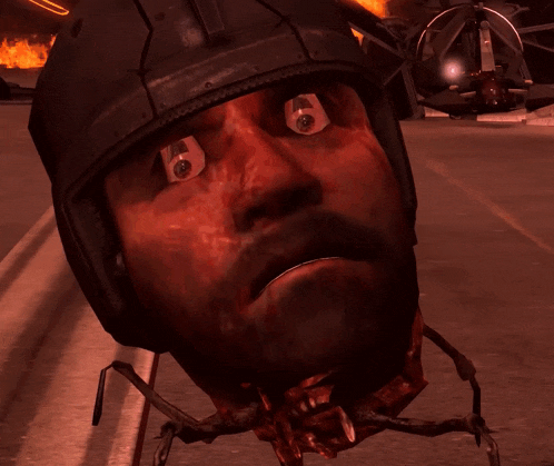 a close up of a man 's face with a helmet on his head