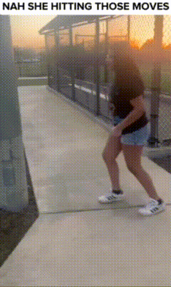 a woman is walking down a sidewalk with the caption nah she hitting those moves above her