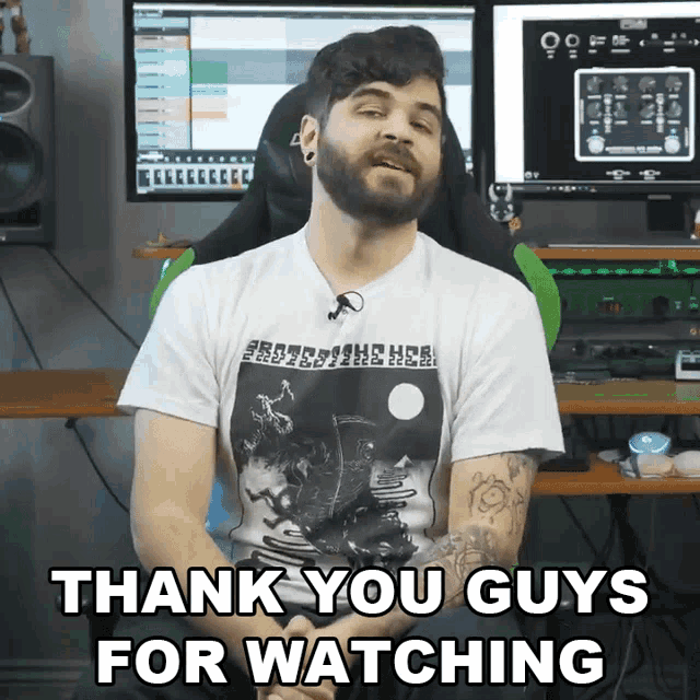 a man says thank you guys for watching while wearing a white shirt