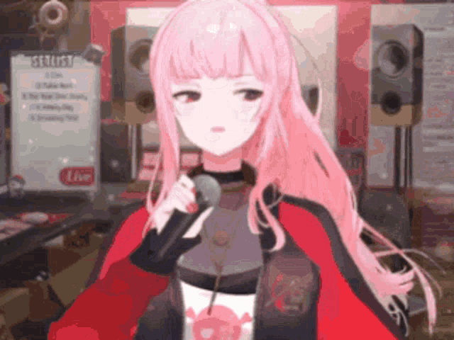 a girl with pink hair is holding a microphone