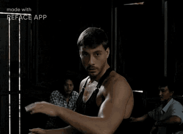 a man is fighting another man in a bar .