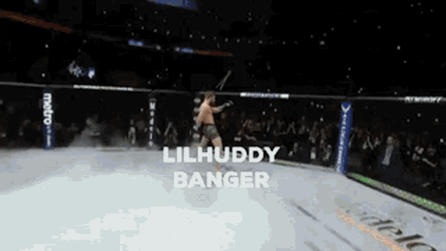a fighter named lilhuddy banger is jumping in the air