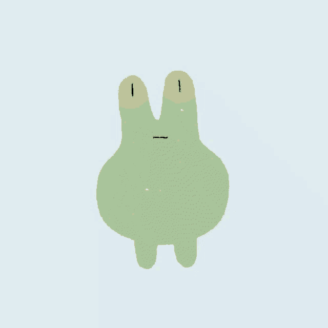 a green frog with two orange eyes and a black line between the eyes