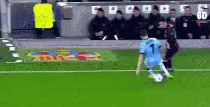 a soccer player with the number 1 on his jersey is kicking the ball
