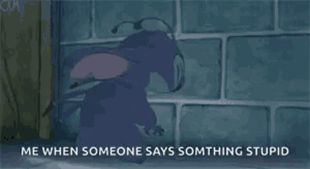 a cartoon character is standing in front of a brick wall and saying `` me when someone says something stupid '' .
