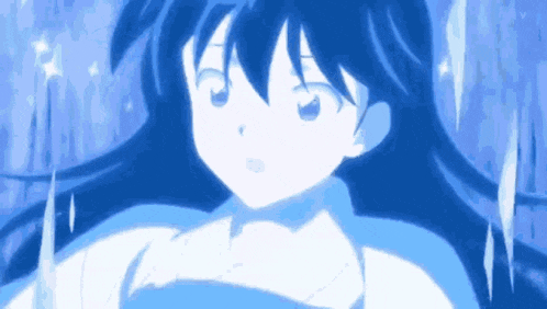 a close up of a person 's face with blue hair .