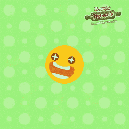 a yellow smiley face is surrounded by brownies on a green surface