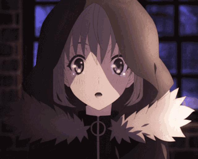 a girl in a hooded jacket with a circle around her neck looks surprised