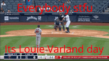 a baseball game between the yankees and the phillies is going on