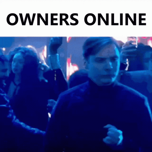 a man in a black turtleneck is dancing in a crowd with the words owners online above him .
