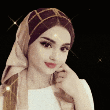 a woman wearing a scarf around her head and a white shirt
