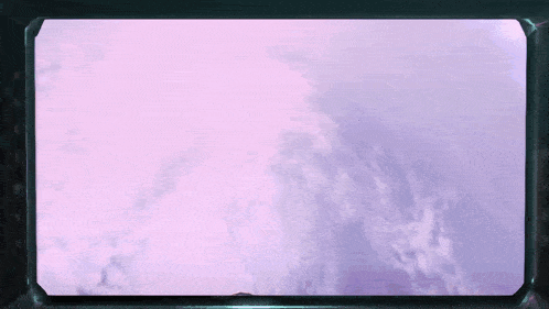 a purple sky with a few clouds and a statue in the foreground