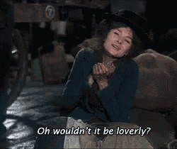 a woman in a hat says oh would n't it be lovely