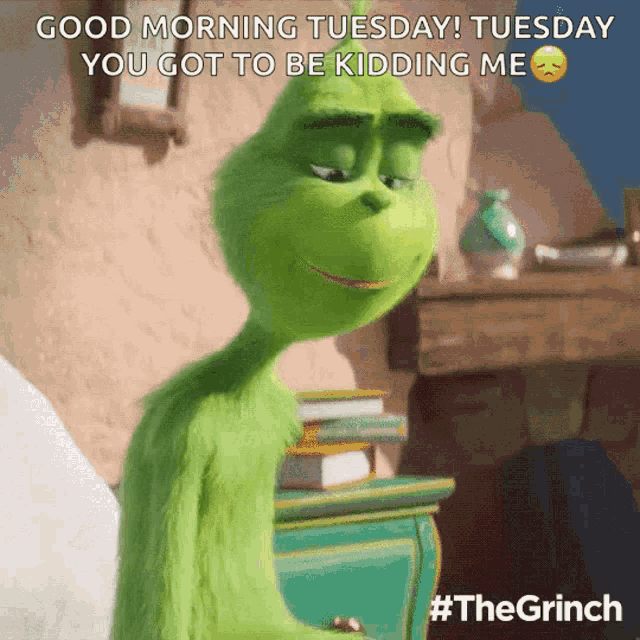 a grinch from the movie the grinch says good morning tuesday