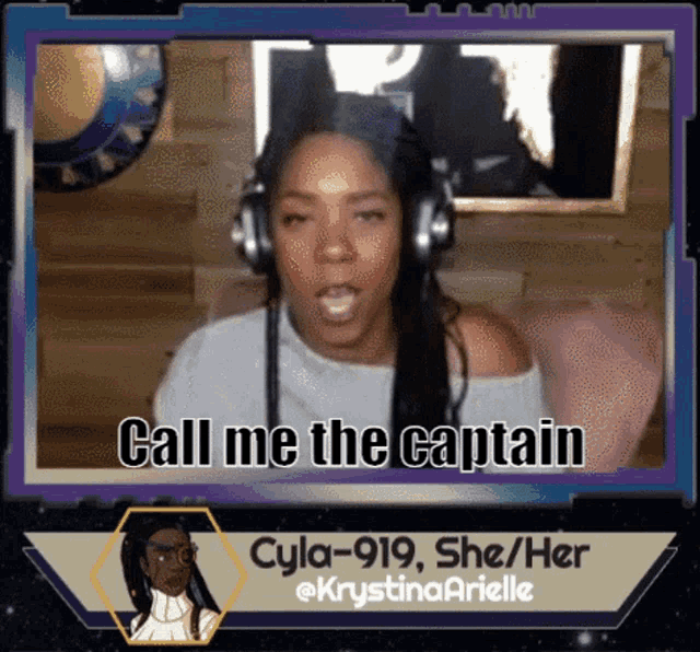 a woman wearing headphones is saying " call me the captain "