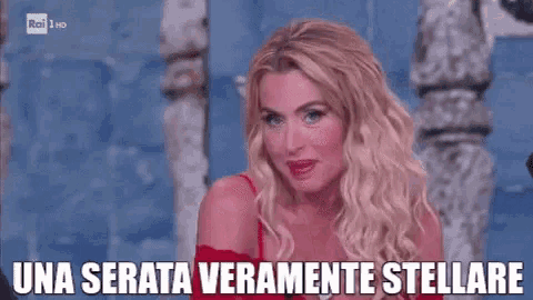 a woman says una serata veramente stellare in a foreign language