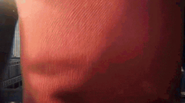 a close up of a person 's face with the sun shining on it