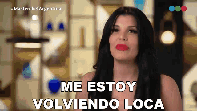 a woman with long black hair and red lips says me estoy volvendo loca