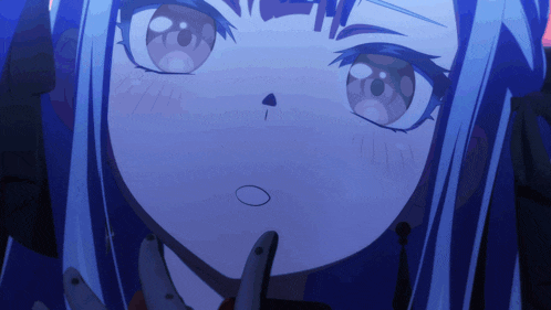 a close up of a girl with blue hair