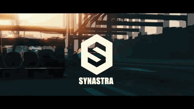 a logo for synastra is shown in front of a car