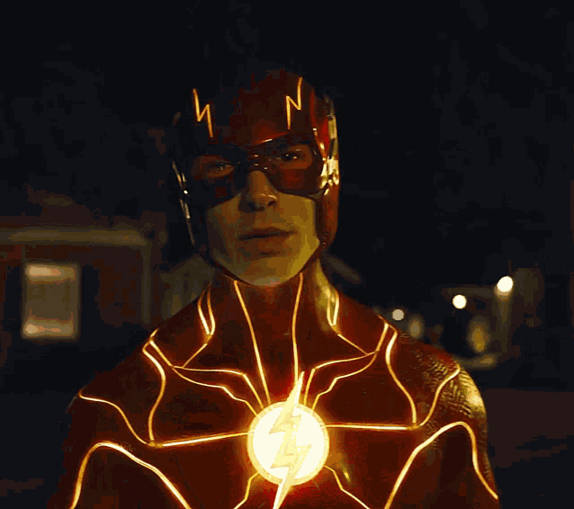 a man in a flash costume has the letter n on his helmet