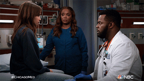 a nbc ad for chicagomed shows a doctor talking to a patient and a nurse