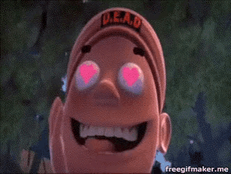 a close up of a cartoon character with heart shaped eyes .