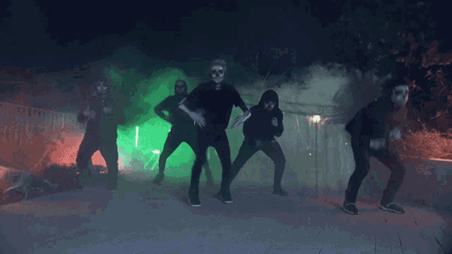 a group of people dressed up as zombies are dancing