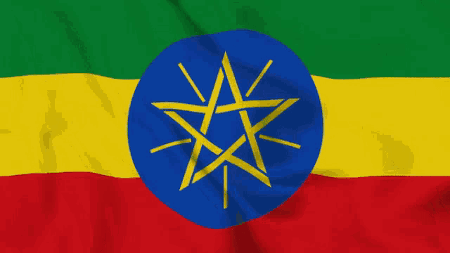 the flag of ethiopia has a blue circle with a yellow star in the middle