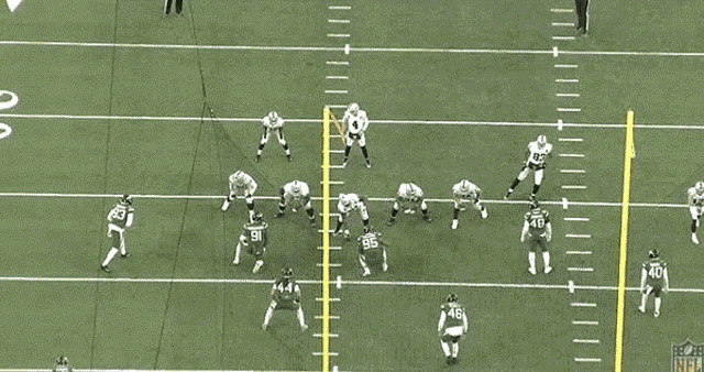 a football game is being played on a field with the nfl logo visible