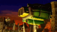 a green and yellow car is flying through the air in a video game .