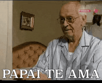 an elderly man in pajamas says papai te ama in front of a couch