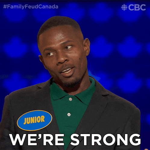 a man with a name tag that says junior on it says we 're strong