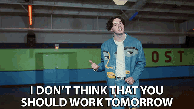 a man in a blue jacket says i don t think that you should work tomorrow