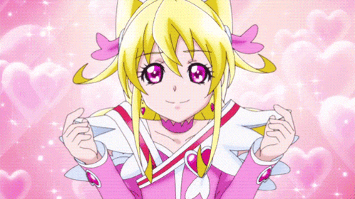 a close up of a cartoon character with hearts behind her