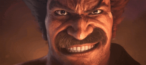 a close up of a man 's face with a very angry expression